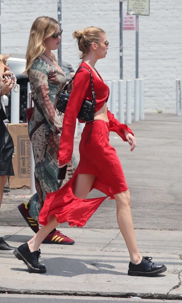 Stella Maxwell in a Red Satin Dress