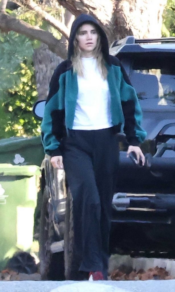 Suki Waterhouse in a Black Pants