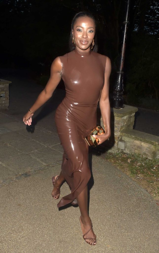 AJ Odudu in a Brown Latex Dress