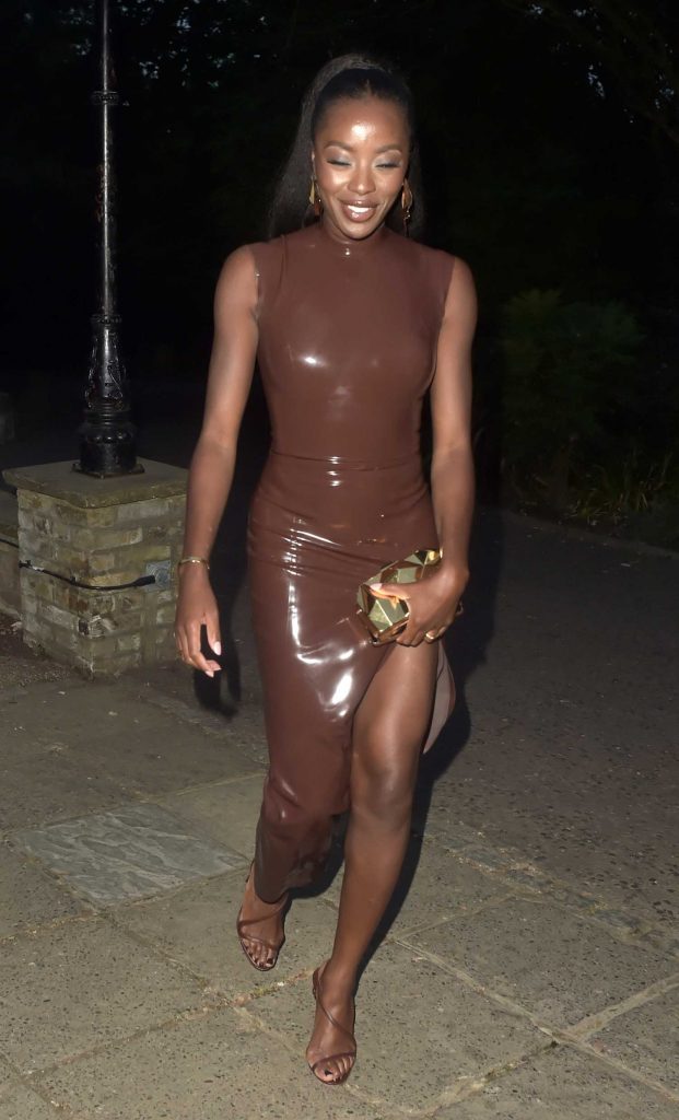 AJ Odudu in a Brown Latex Dress