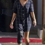 Aubrey Plaza in a White Cap Was Spotted while Shopping with Boyfriend Jeff Baena at Lazy Acres in Los Feliz