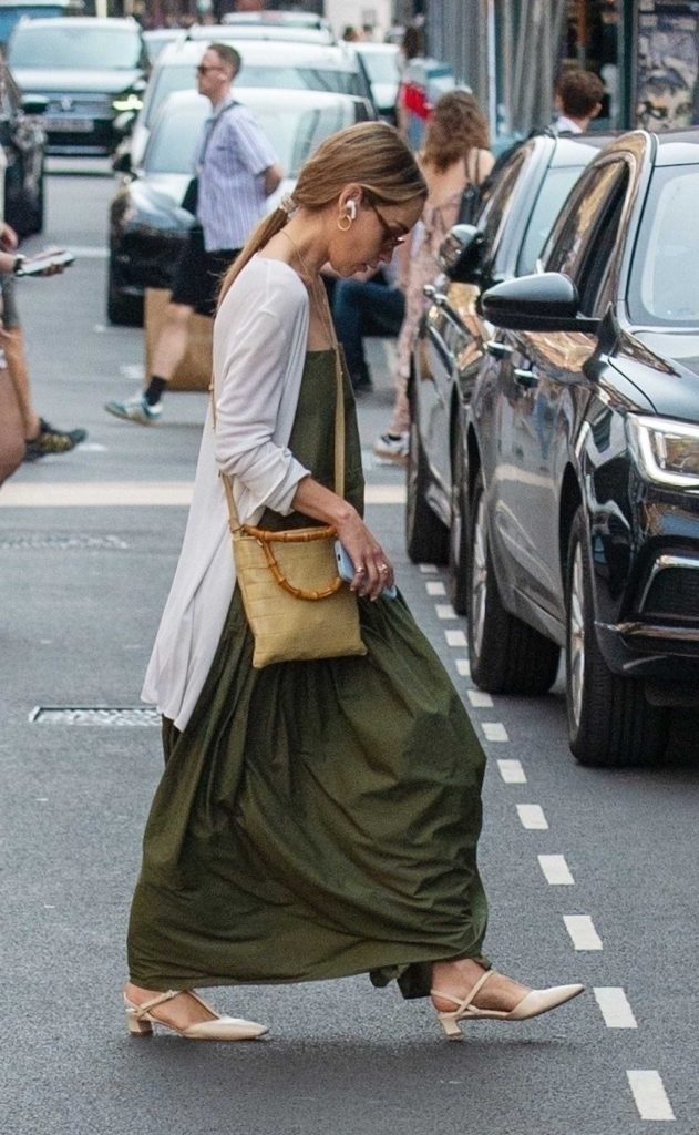 Emilia Clarke in an Olive Dress