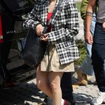 Jenna Ortega in a Plaid Blazer Arrives at Marco Polo Airport for the 81st Venice International Film Festival in Venice