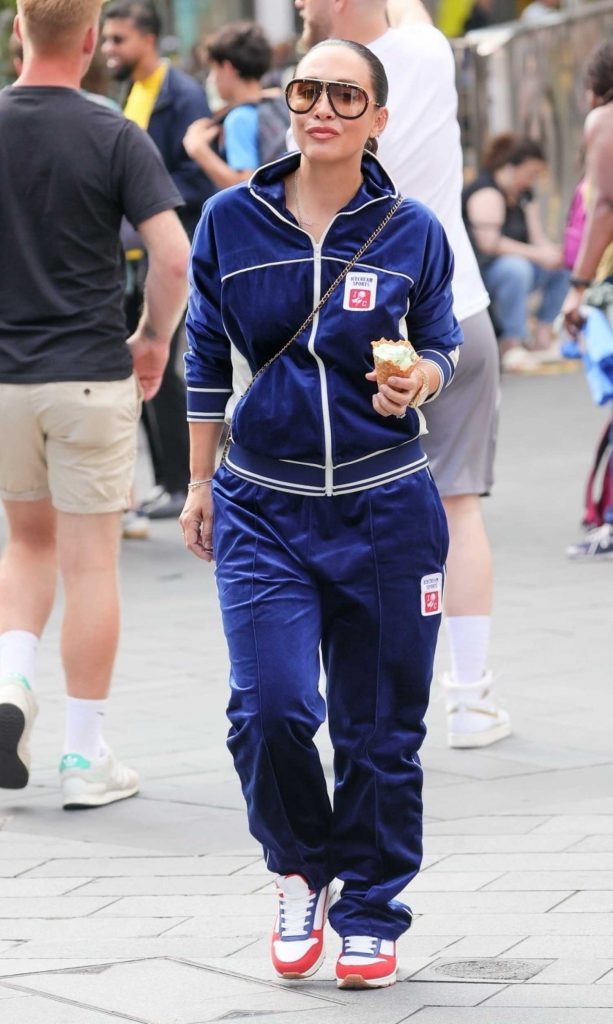 Myleene Klass in a Neon Blue Tracksuit