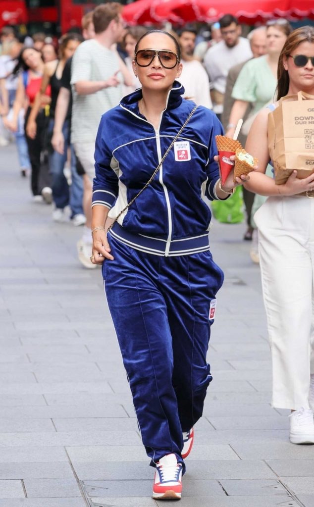 Myleene Klass in a Neon Blue Tracksuit