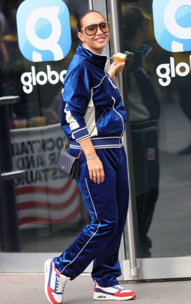 Myleene Klass in a Neon Blue Tracksuit