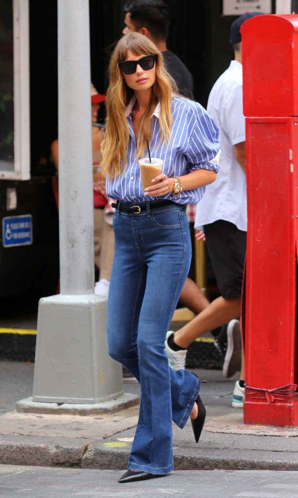 Sarah Holt in a Blue Striped Shirt