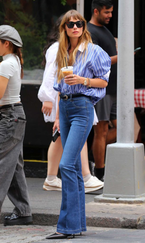 Sarah Holt in a Blue Striped Shirt