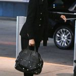 Adriana Lima in a Black Blazer Pushed Her Luggage through JFK Airport in New York