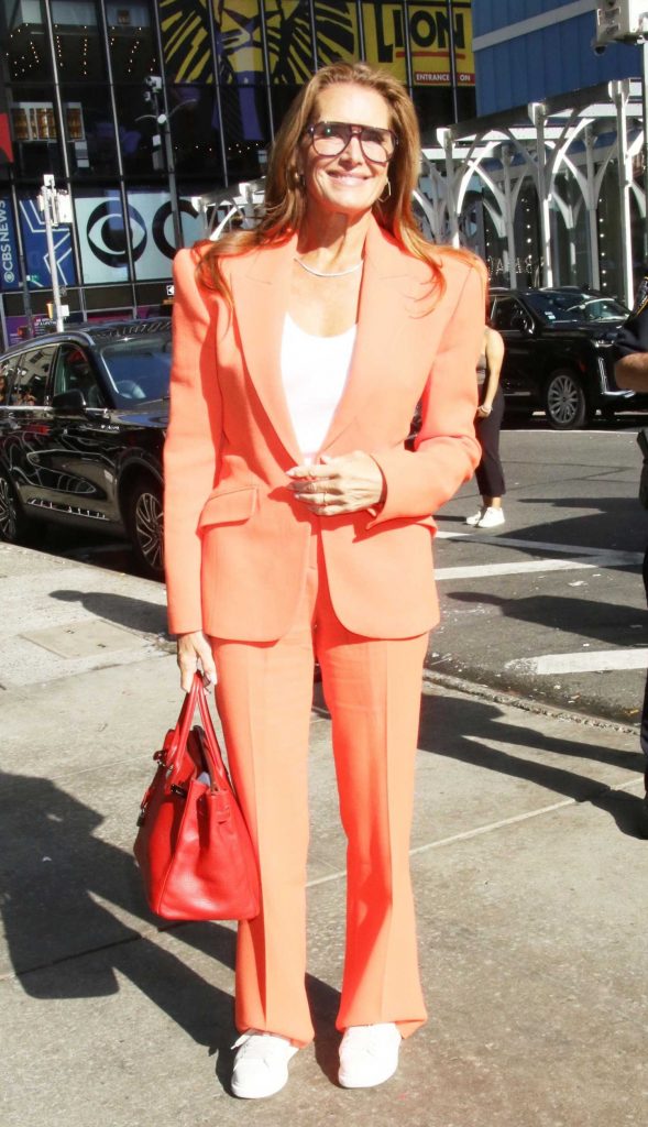 Brooke Shields in an Orange Pantsuit