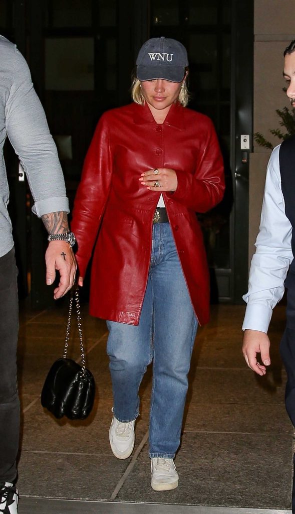 Florence Pugh in a Red Leather Trench Coat