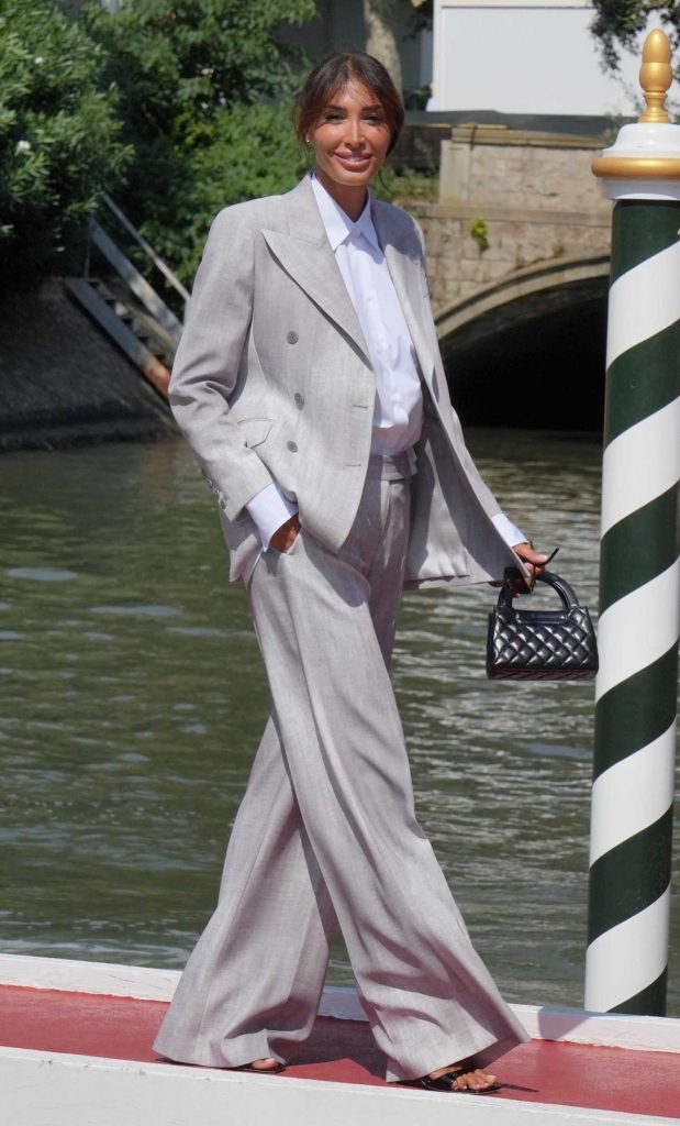 Giorgia Venturini in a Grey Pantsuit