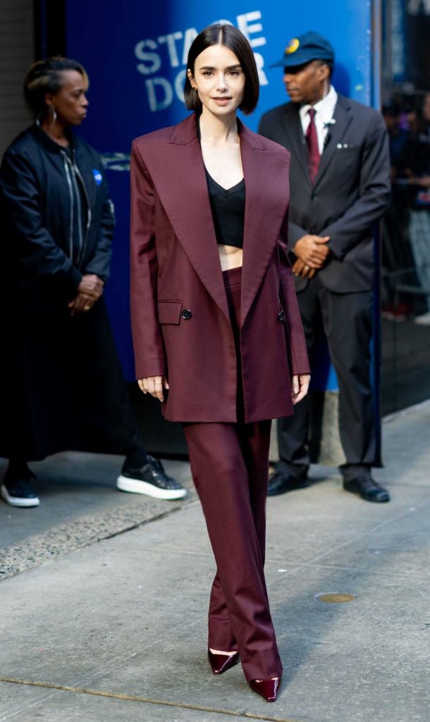 Lily Collins in a Burgundy Pantsuit