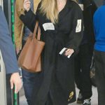 Angelina Jolie in a Black Coat Arrives at JFK Airport in New York