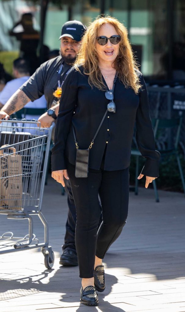 Catherine Bach in a Black Blouse