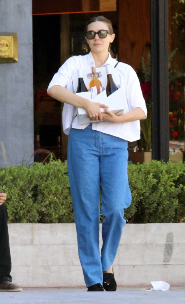 Elizabeth Olsen in a White Blouse