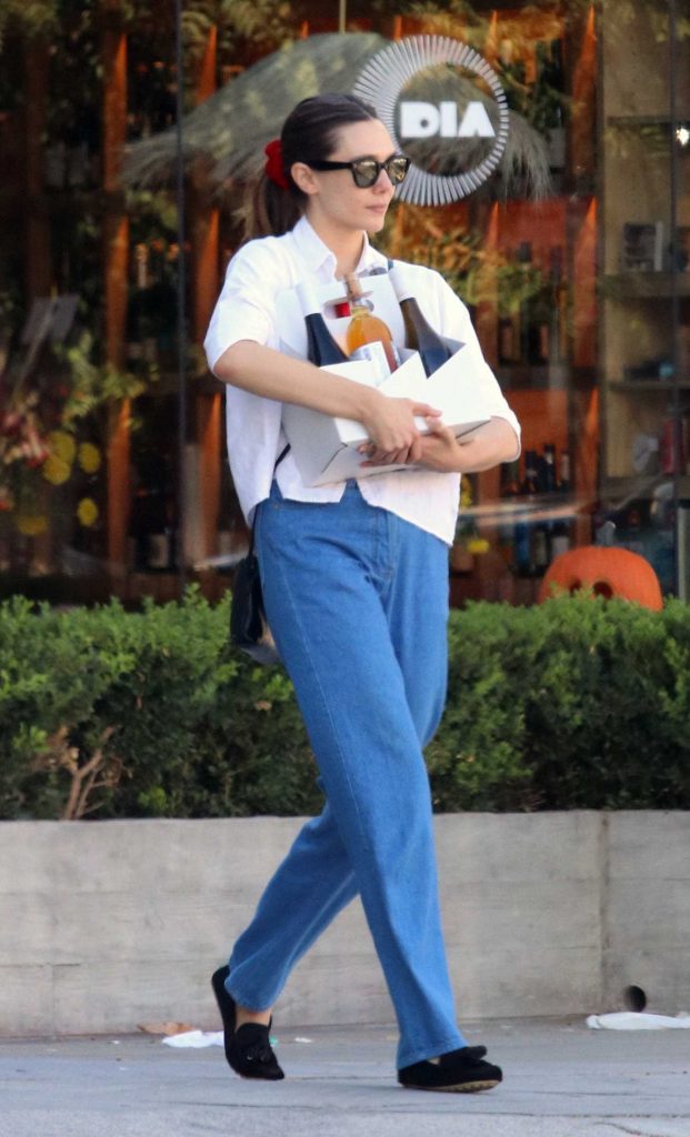 Elizabeth Olsen in a White Blouse