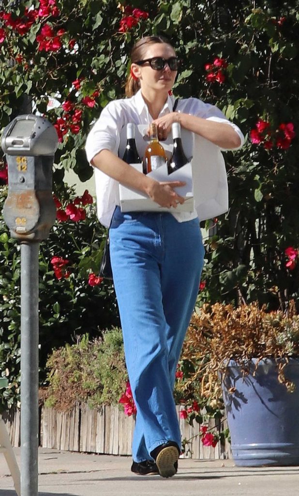 Elizabeth Olsen in a White Blouse