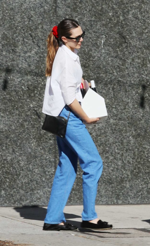 Elizabeth Olsen in a White Blouse