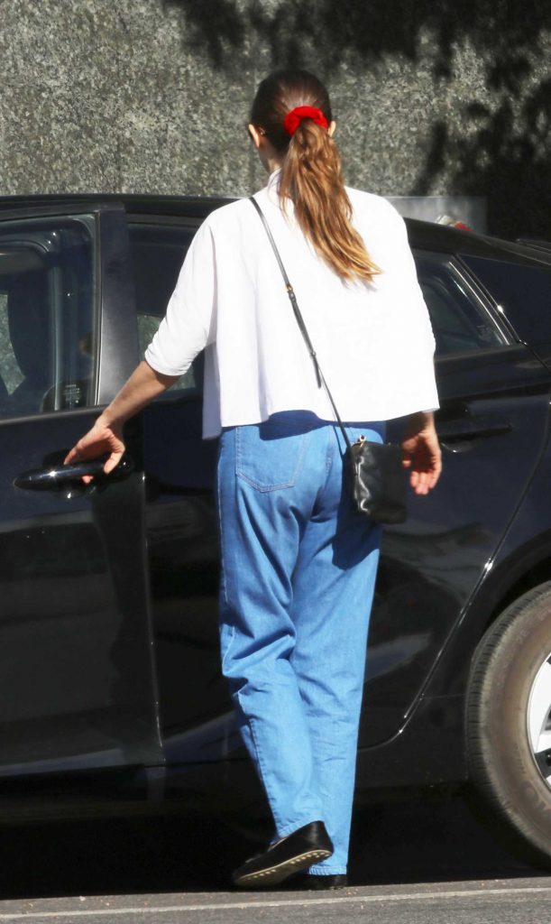 Elizabeth Olsen in a White Blouse