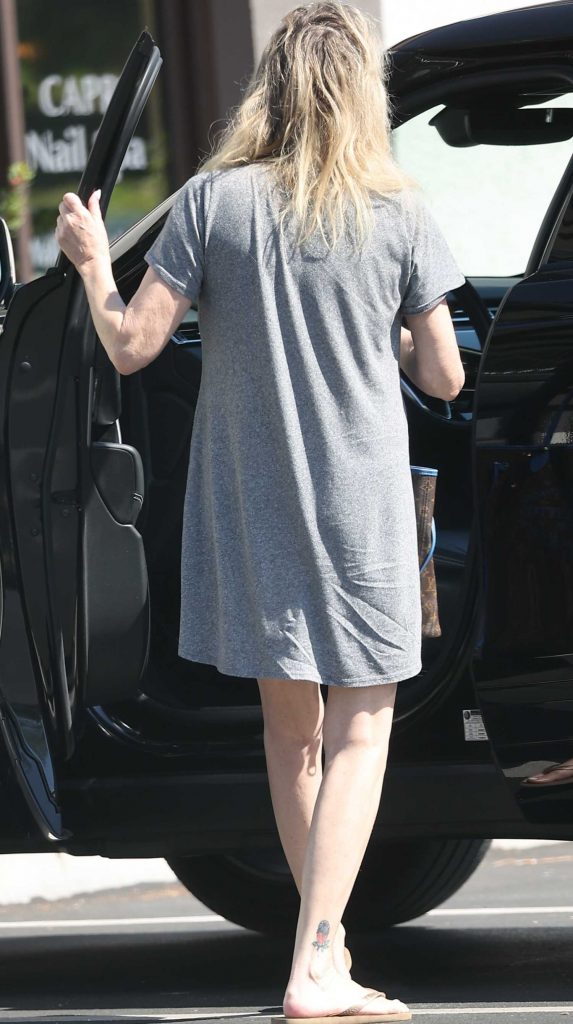 Heather Locklear in a Grey Tee-Dress