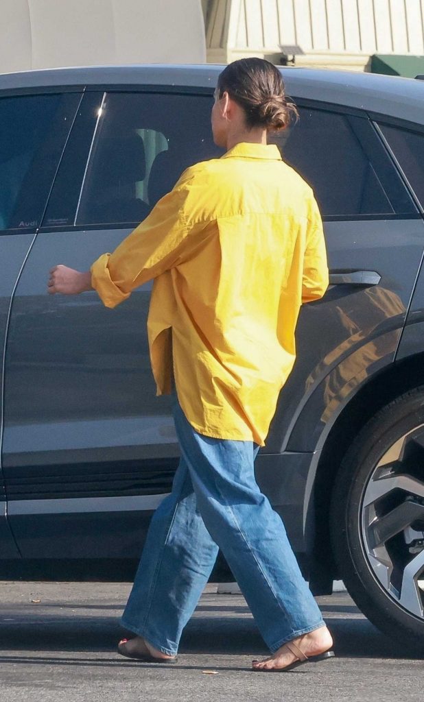 Khatira Rafiqzada in a Yellow Shirt