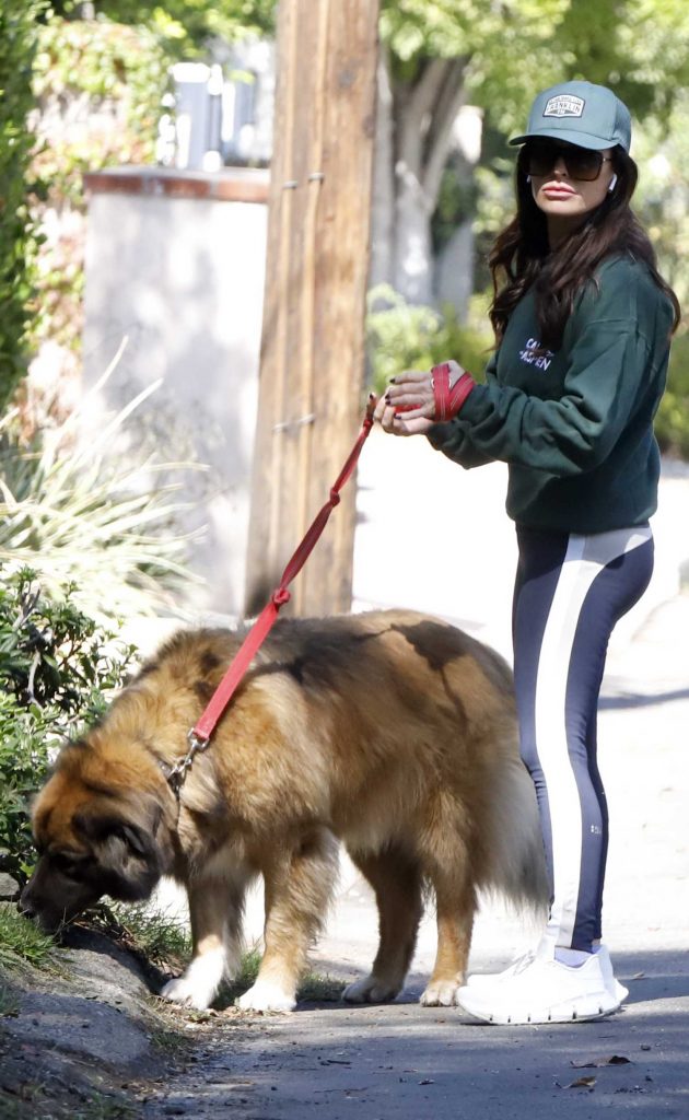 Kyle Richards in a Green Sweatshirt