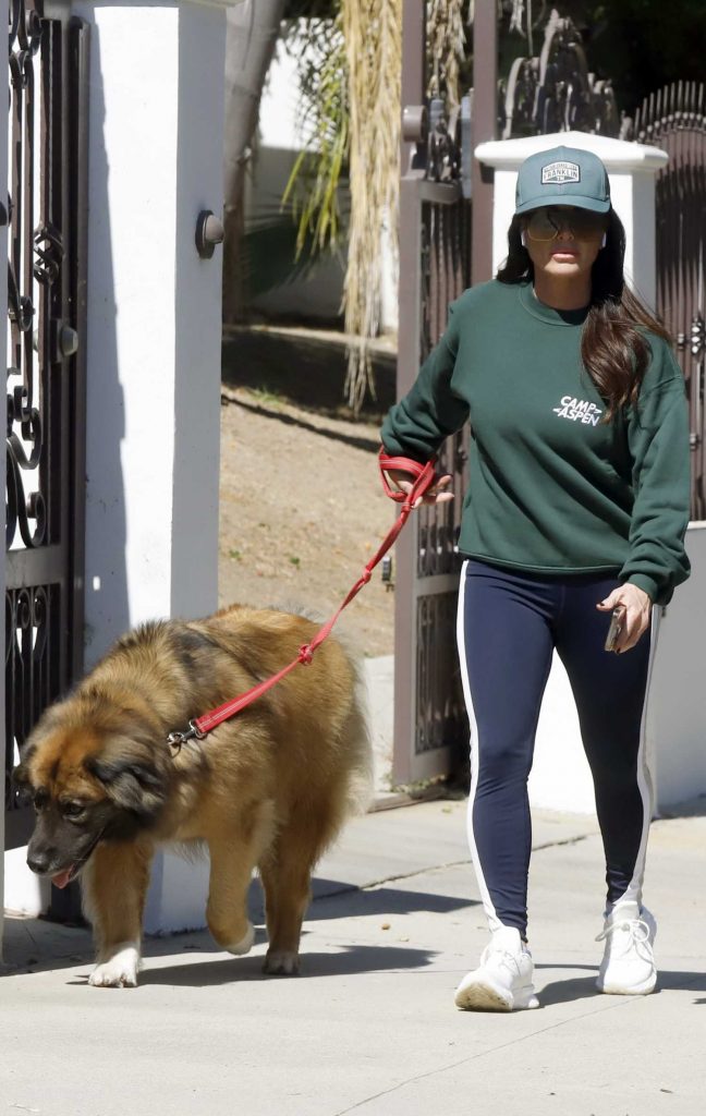 Kyle Richards in a Green Sweatshirt