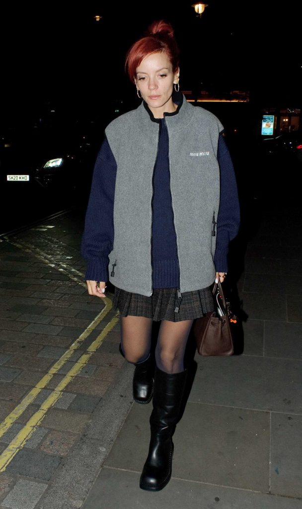 Lily Allen in a Black Knee-Length Boots