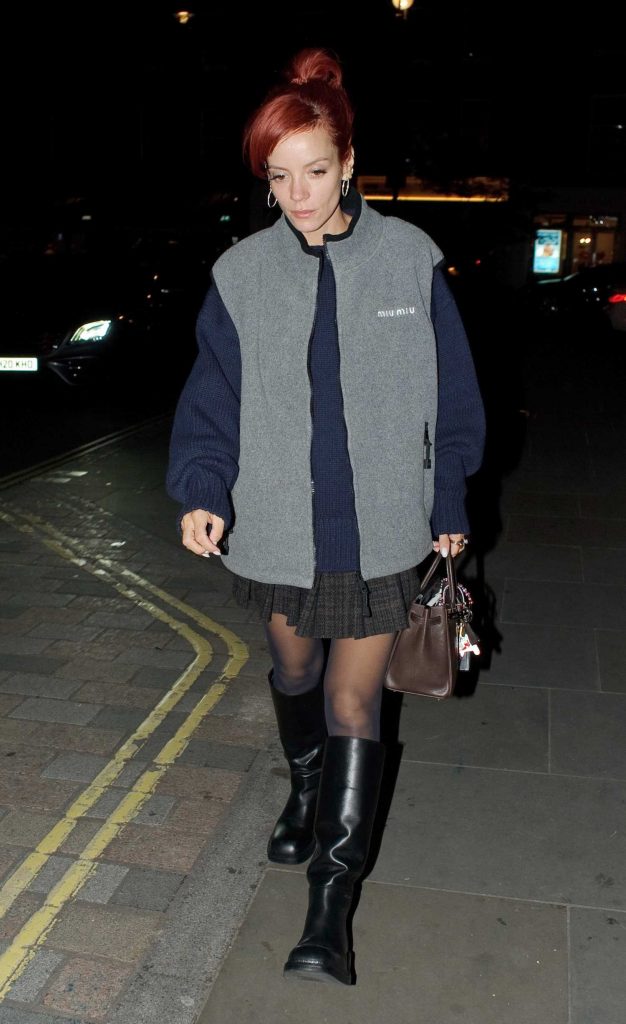 Lily Allen in a Black Knee-Length Boots