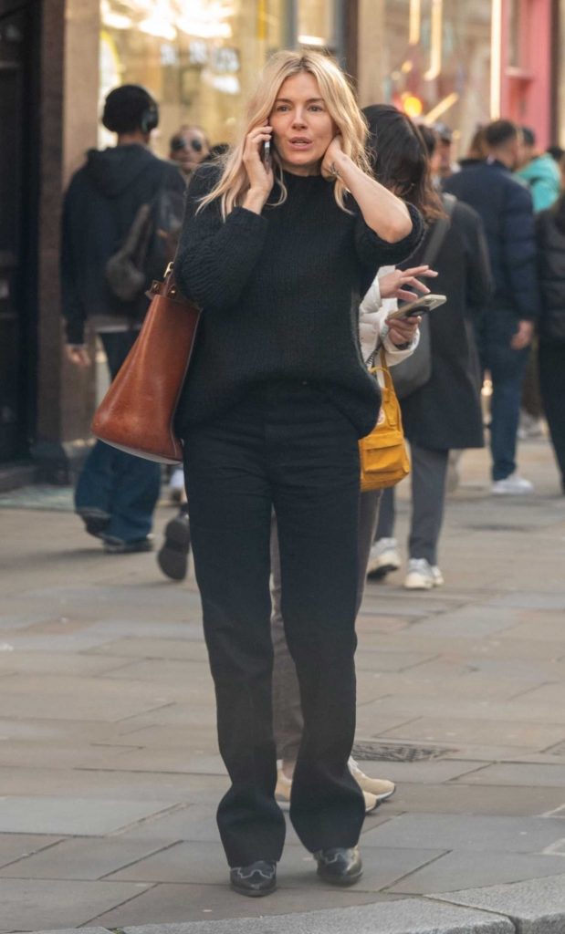 Sienna Miller in a Black Sweater