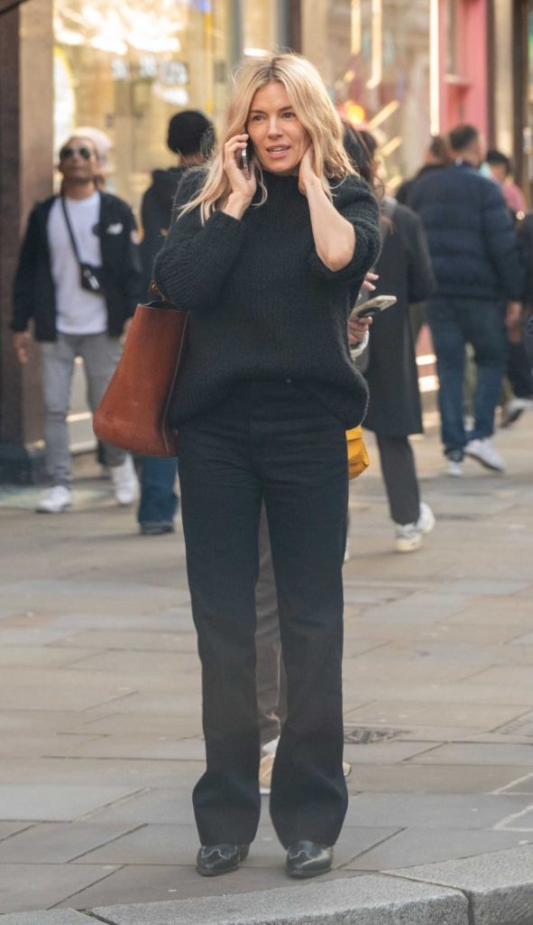 Sienna Miller in a Black Sweater