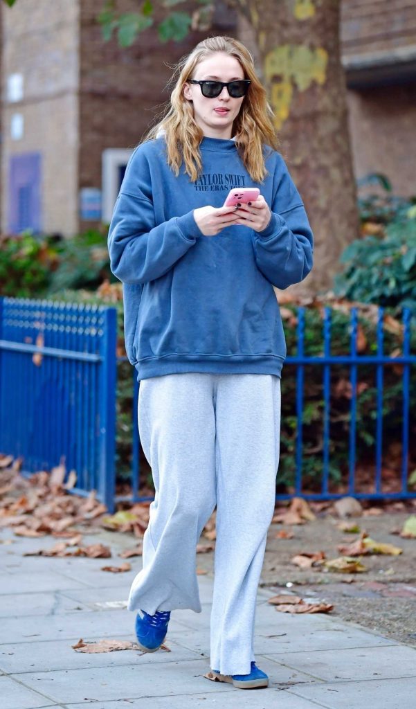 Sophie Turner in a Blue Sneakers