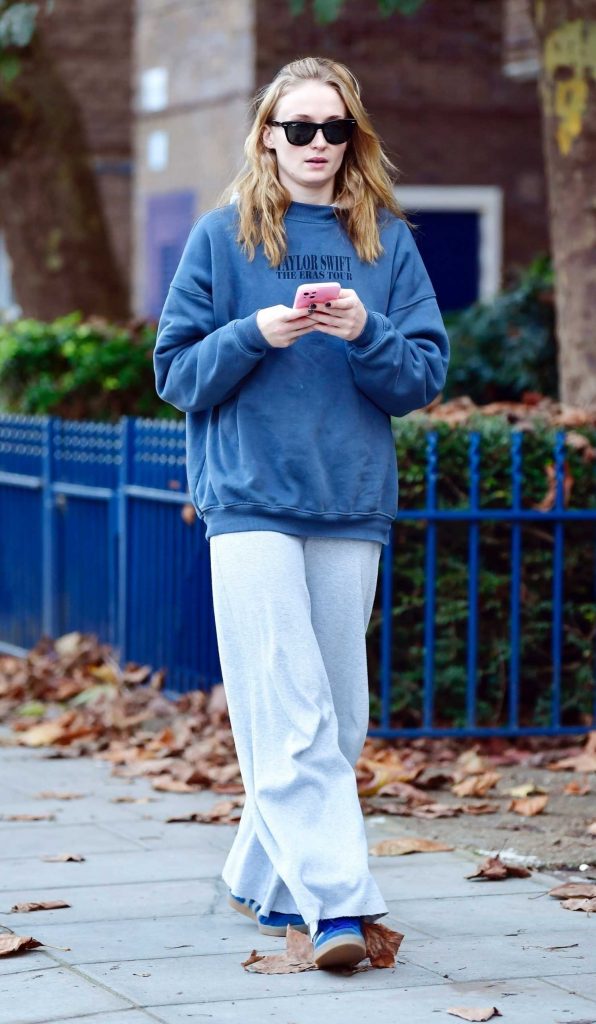 Sophie Turner in a Blue Sneakers