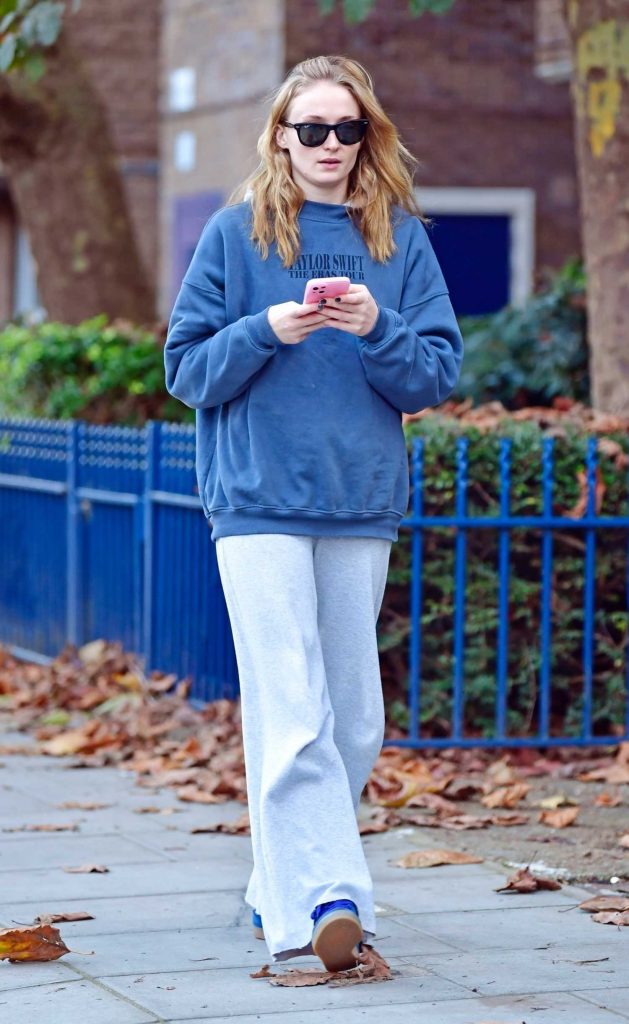 Sophie Turner in a Blue Sneakers