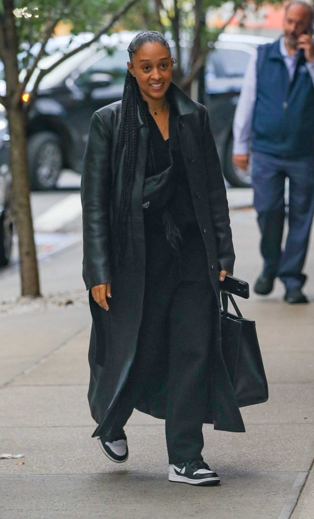 Tia Mowry in a Black Leather Coat