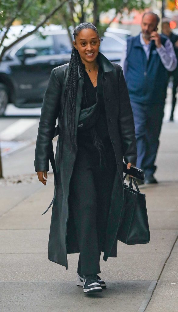 Tia Mowry in a Black Leather Coat