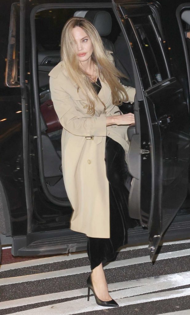 Angelina Jolie in a Beige Trench Coat