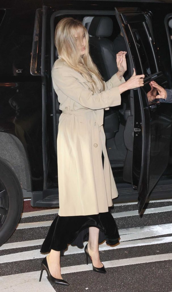 Angelina Jolie in a Beige Trench Coat