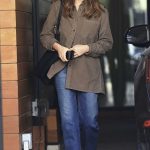 Chrissy Teigen in a Brown Shirt Arrives at a Studio in West Hollywood