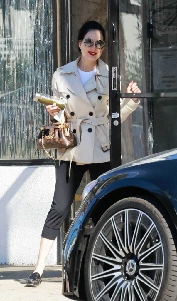 Dita Von Teese in a White Jacket