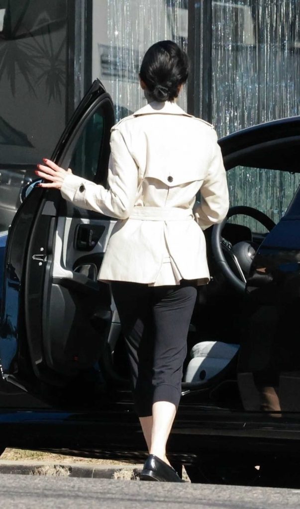 Dita Von Teese in a White Jacket