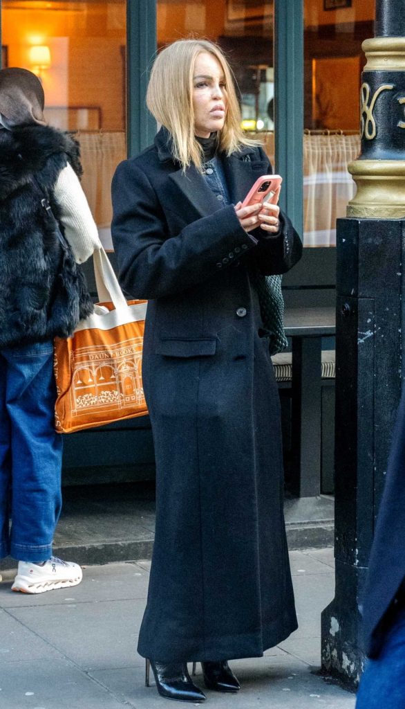 Katie Piper in a Black Coat