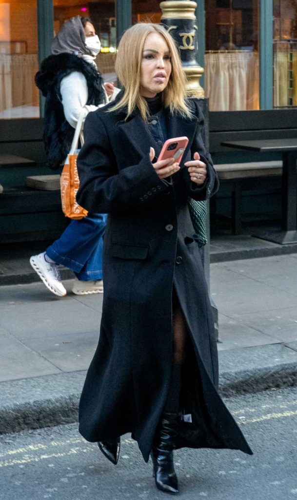 Katie Piper in a Black Coat