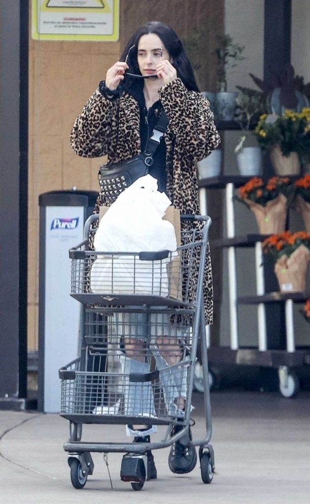 Krysten Ritter in a Leopard Print Fur Coat