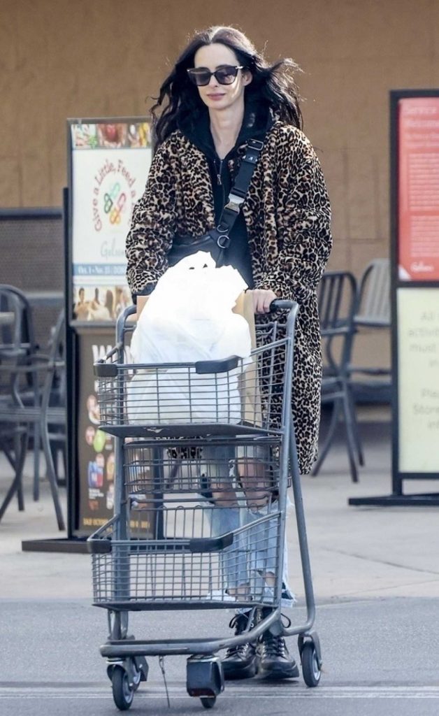 Krysten Ritter in a Leopard Print Fur Coat