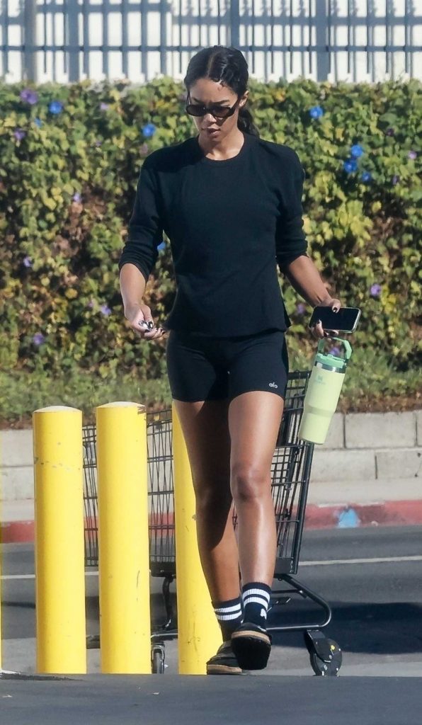 Laura Harrier in a Black Workout Ensemble