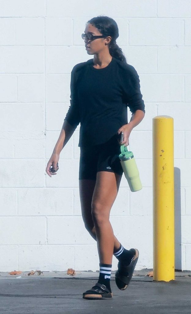 Laura Harrier in a Black Workout Ensemble