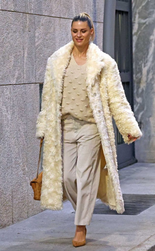 Michelle Hunziker in a White Faux Fur Coat