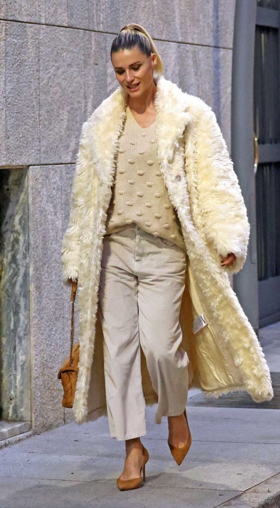 Michelle Hunziker in a White Faux Fur Coat